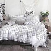 Parure de lit à carreaux unis